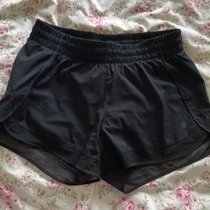 Athlete size small Racer Run short. Adjustable waistband and inside lining